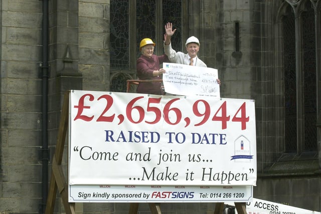 Sheffield Cathedral Development Campaign Fund has reached a target of £2.5million..Jenny Lee Chair of the Campaign and Dave Wickett MD Kelham Island Brewery who has supported the campaing thorugh the sale of Cathedral Ale unveil the target board and present a cheque from the Brewery