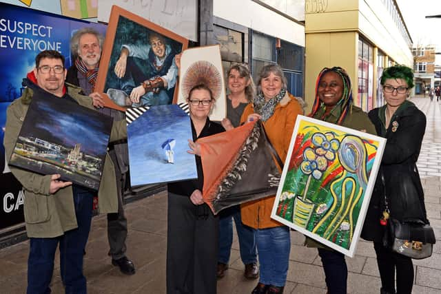 Richard Appleby, Terry Chipp, Marcia White, Maia Weerdmeester, Tracey Moore, Chinwe Russell and Becky Rydel, pictured outside the unit at Waterdale which artists are crowdfunding to refurbish so it can be converted it into a commercial Art Gallery. Picture: NDFP-03-03-20-ArtGalleryProject 1-NMSY