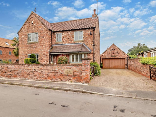 The approach to the property that's for sale in the village of Misson.