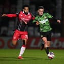 Luke Molyneux challenges for the ball. Picture: Howard Roe/AHPIX LTD