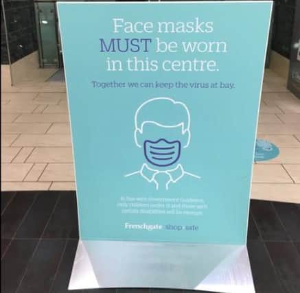 Signs at the Frenchgate Centre, in Doncaster,  warning people they must wear a facemask