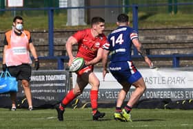 Saracens' Owen Farrell takes on Doncaster's Kyle Evans. Pictures: Jonathan Gawthorpe