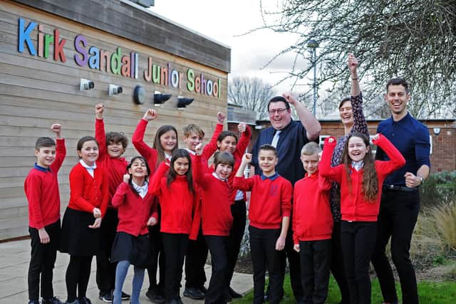 Kirk Sandall Junior School has received a good Ofsted report. Richard Fairgrieve, Head of School, Joanne Addy, Deputy Headteacher and Ashleigh Eastwood, Assistant Headteacher, pictured celebrating with school children. Picture: NDFP-08-02-22-OfstedKirkSandall 1-NMSY