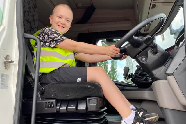 Getting into the driving seat is eight-year-old Zak