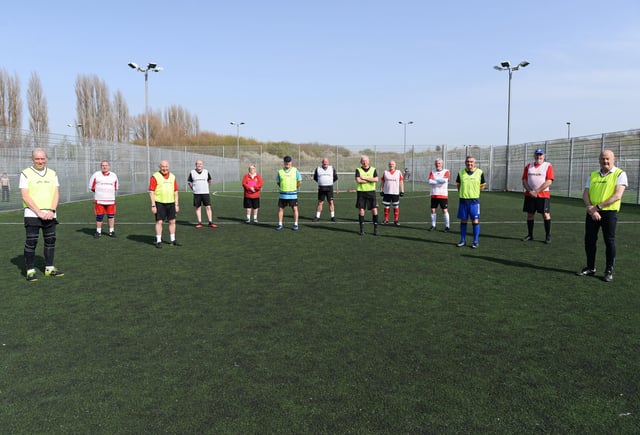 Retro Rovers Walking Football. Jan Milner, Manager and Coach, pictured with players at the Keepmoat Stadium. Picture: NDFP-30-03-21-WalkingFootball 1-NMSY