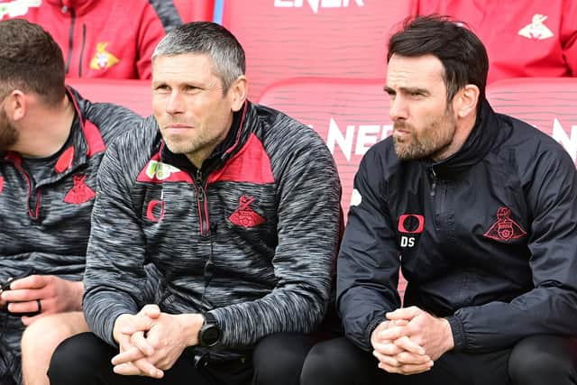 Doncaster boss Danny Schofield (right) pictured with goalkeeper coach Ian Bennett.