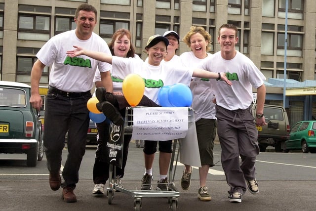 Asda staff, from left, Gary Hardy, Andrea Hutchinson, Carol Ford, Cheryl Briggs, Michelle Leishman and Matt Nicholls set off on their charity trolley push from Doncaster Royal Infirmary to their Carcroft store back in 2000