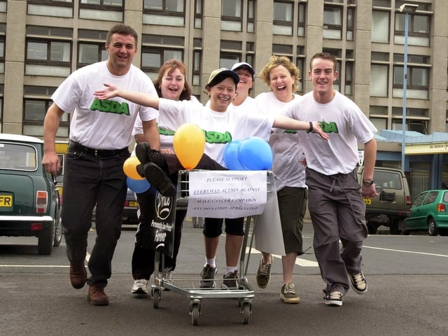 Asda staff, from left, Gary Hardy, Andrea Hutchinson, Carol Ford, Cheryl Briggs, Michelle Leishman and Matt Nicholls set off on their charity trolley push from Doncaster Royal Infirmary to their Carcroft store back in 2000