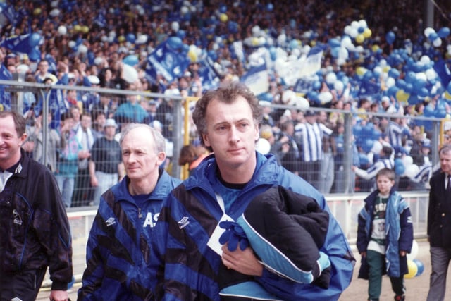 Manager Trevor Francis with physio Alan Smith, left, walk from the famous, old Wembley tunnel to take their seats on the bench for Wednesday's FA Cup semi-final against United in April 1993.
