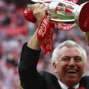 John Ryan celebrates promotion from League One in 2008.