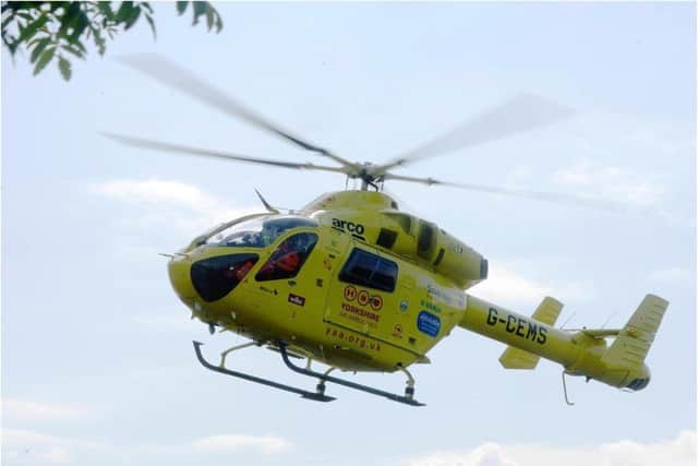 The air ambulance has landed at the scene in Wheatley Hall Road after reports of a child falling from height.