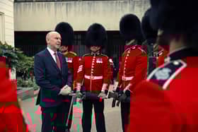 John Healey has announced £50m of funding to help military veterans.