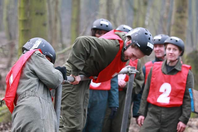 Millie Bright lifts herself up as Belles tackle an army assault course in preparation for the 2011 WSL campaign. Picture: Holly Allen.