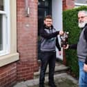 Russ Thompson, and son Luke, show one of the containers they are using for deliveries