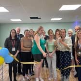 Dr Alan Billings (second from left) joins the celebrations as the new specialist wellbeing room at Doncaster Deaf Trust officially opens