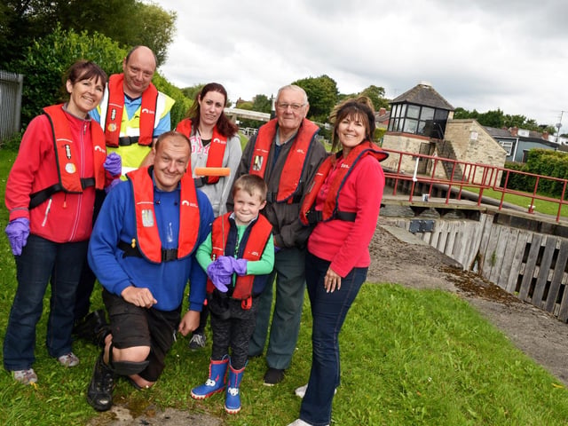 Dan Goddard, Mexborough Ferryboat Association team leader (front left), pictured with volunteers back l-r Pam Chambers, Darren Lucas, Natalie Seddons, Chaz Prouten and Chris Dalton. Front Elijah Goddard, five back in 2017