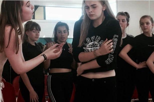 Louise, aged 14, in 2017, in a production of Les Mis.