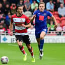 Doncaster Rovers' Jamie Sterry dribbles with the ball against Harrogate Town.