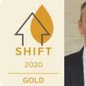 The SHIFT gold award and Dave Richmond. chief executive of St Leger Homes