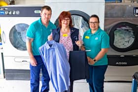 Paul Hallas, Laundry Assistant; Janet Hodgkins, Laundry Supervisor; and Jenny Evans, Laundry Assistant.