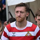 Rovers' Tom Anderson netted late on to earn a valuable point at MK Dons.