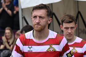 Rovers' Tom Anderson netted late on to earn a valuable point at MK Dons.