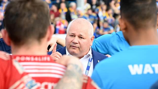 Dons chief executive Carl Hall talks to his players after the play-off final defeat to Workington Town. Photo: Howard Roe/AHPIX.com