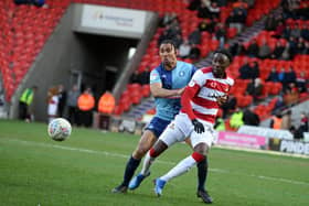 Devante Cole battles against Wycombe Wanderers