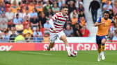 Luke Molyneux in action for Doncaster Rovers.