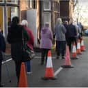 People in Doncaster queue for their coronavirus vaccine.