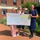 Daniel and Dannielle hand over their fundraising to the Serenity Appeal