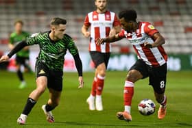 Doncaster's Luke Molyneux attacks against Lincoln City.