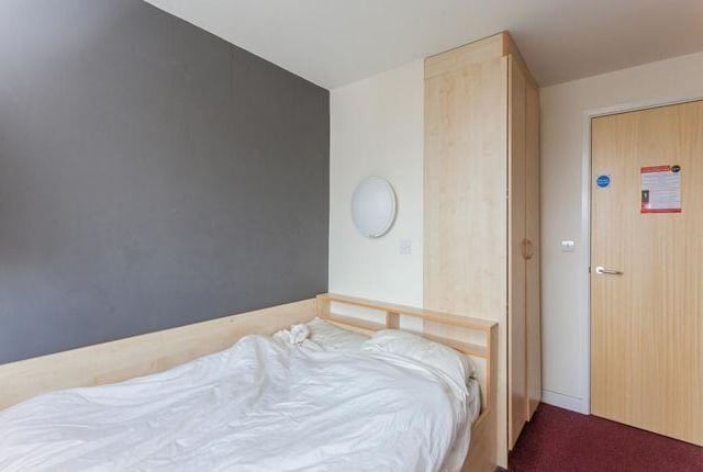 The room is carpeted throughout and benefits from large window to the end of the room.