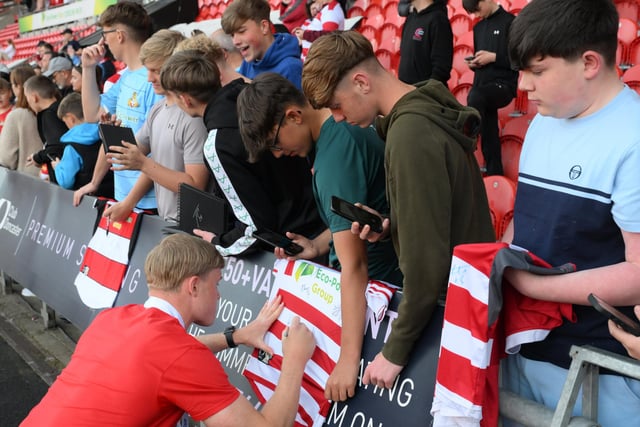 Rovers fans gathered to see the League Two trophy being paraded and meet players and staff as part of the club's title celebration event.