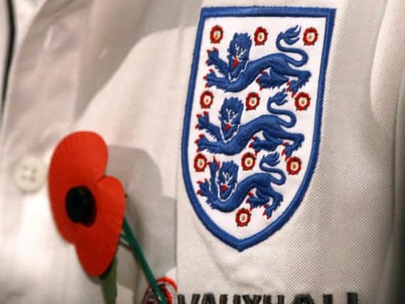Fifa have previously banned the poppy from ENgland shirts: