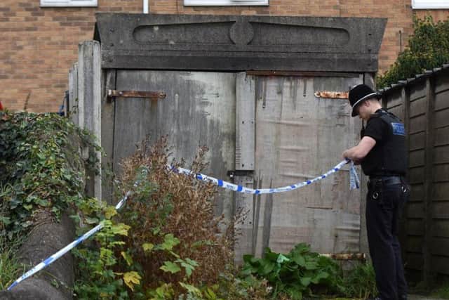 Police at the scene of the tragedy