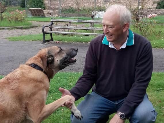 Peter Smith, 61, with his dog Barney