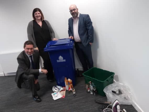 Pictured with the new style bins are (l-r) Lee Garrett, Doncaxster Council head of waste and highways infrastructure, Lee Richardson, Doncaster Council waste and re-cycling manager, and Matthew Canning, Suez regional manager municipal