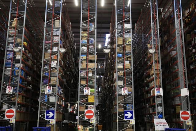A tour of the Amazon base  at Doncaster iPort as the Christmas rush begins to start. Items arrive at the warehouse and are sorted and stacked ready for picking when a order arrives.  Picture: Chris Etchells