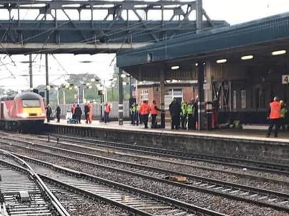 Emergency services deal with the incident at Doncaster railway station.