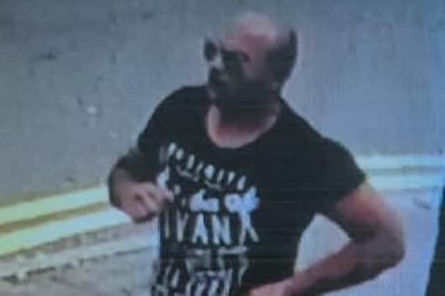Police have re-released a CCTV image of a man who they believe "could hold vital information" about the robbery.