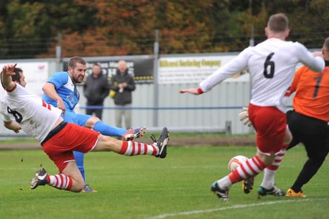 Willie McGhie scores for Rossington. Photo: Russell Sheppard.