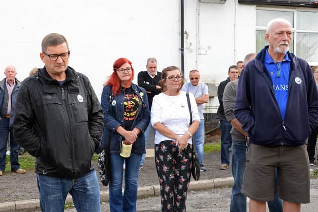 Paul Heaton, takes a minute with others to remember the Miners and their families. Picture: Marie Caley NDFP-13-09-18-HatfieldMainMemorial-4