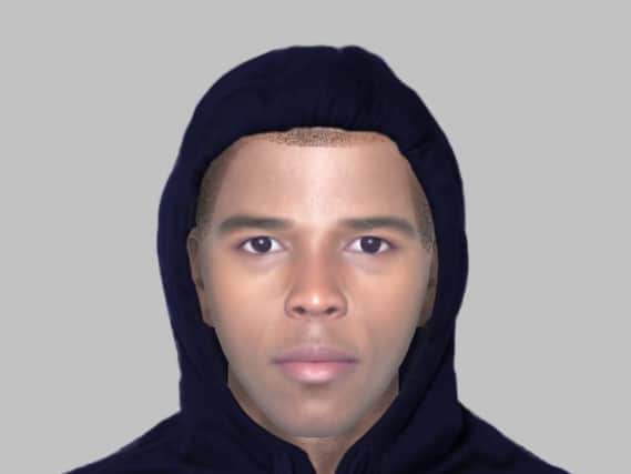 Police have released an e-fit of a man they would like to speak to in connection with an armed robbery in Doncaster
