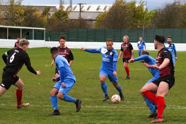 Action from Armthorpe Welfare's defeat at Shirebrook Town