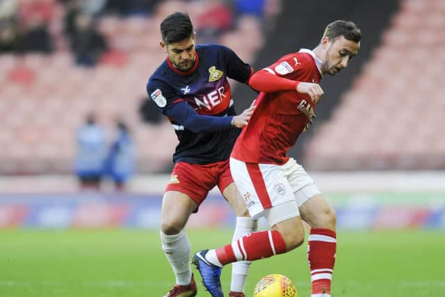 Barnsley v Doncaster Rovers
Skybet League One
Barnsley's Mike Bahre hustles  Doncaster's Danny Andrew