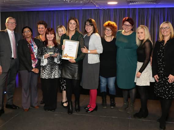 NHS staff and volunteers who work in Doncaster have had their achievements and dedication recognised and at an awards ceremony. Pictured are Chairmans Award winners The Early Intervention Team, Doncaster with Trust Chairman Lawson Pater (left) and Trust Chief Executive Kathryn Singh (right)