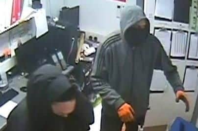 Two men are wanted over a supermarket burglary in Doncaster