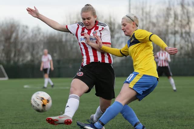 Kirsty Smith clears for Belles. Photo: Julian Barker