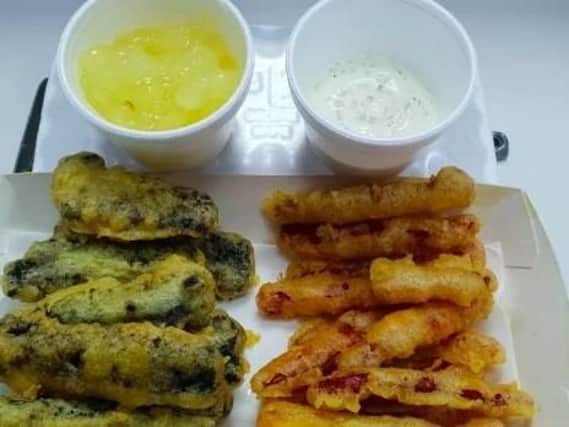 Chorizo fries & pesto mayo (right) and black pudding fries and apple sauce (left) from one of the winning takeaways
